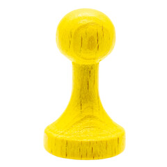 a simple yellow wooden token