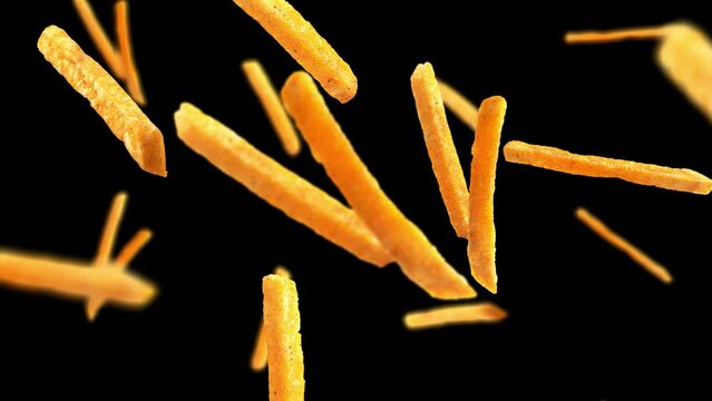 Fried potato chips falling down from top, fast food background  with alpha channel 
