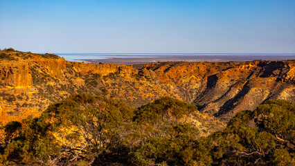 Sunset over a massive gorge in cape range national park in western australia near exmouth;...