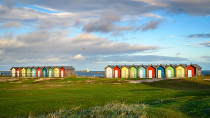 Beach Huts at Blyth South Beach, situated on the promenade these colourful Beach Huts overlook the sandy beach and North Sea on the Northumberland coastline - Powered by Adobe