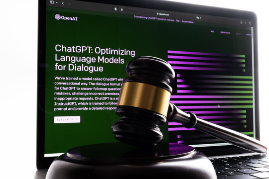 Gavel and ChatGPT front page seen on laptop. Artificial intelligence AI chatbot by Open Ai. Stafford, United Kingdom, January 23, 2023