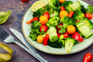 Spring appetizing salad decorated with physalis.
