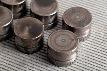 Hydraulic compensators in the lubrication system of a car engine. Knocking and increased clearance in hydraulic lifters, malfunction. Automotive Part, close-up