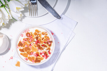 Heart shaped tiny pancakes for cute Valentine's day breakfast or brunch