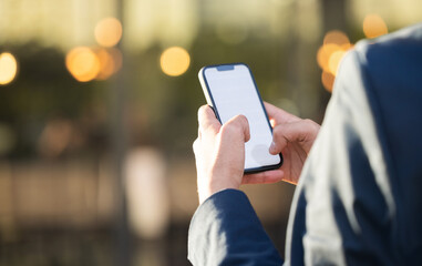 Hands, mockup or business man with phone for networking, social media or communication in London street. Search, travel or manager on smartphone for research, internet or blog content review outdoor