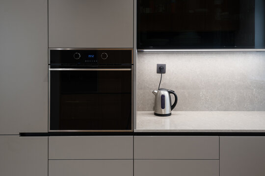 Detail of modern kitchen with built in appliances