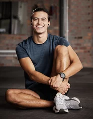 Gordijnen Man, happy portrait and relax fitness in gym for exercise workout, training break and sports wellness mindset. Happy athlete, personal trainer rest and happiness for cardio lifestyle in health club © Jordan C/peopleimages.com