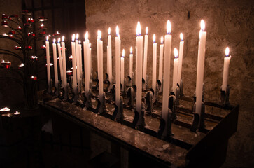 Old candlestick in a medieval Italian church