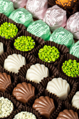 Chocolate. Fine chocolate varieties with white, dark and milk chocolate. Praline Chocolate sweets. close up