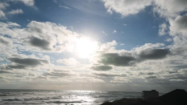 Rodanthe ocean view, morning sun in cloudy sky