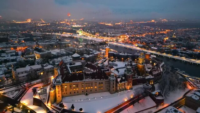 Winter evening flight over Wawel Royal Castle in Krakow (Cracow), Poland