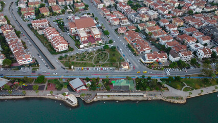 Fototapeta premium Wooden pier. This is often the most popular tourist attraction on the beach. Aerial view with drone. A marina place. 