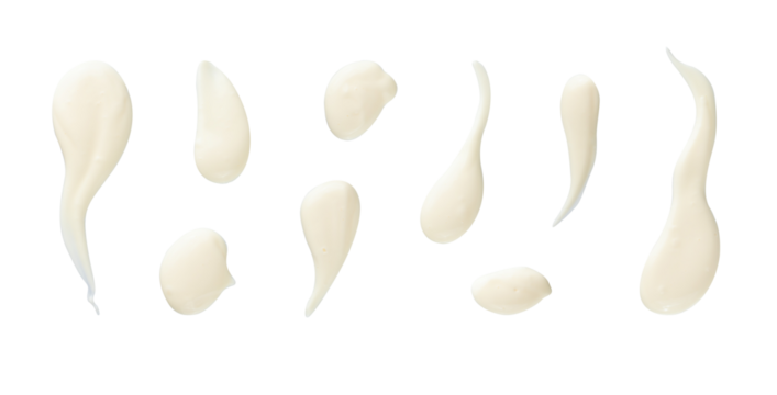 Set of white drops and splashes of mayonnaise or cream sauce isolated on white background. With clipping path. Full depth of field. Focus stacking. PNG 