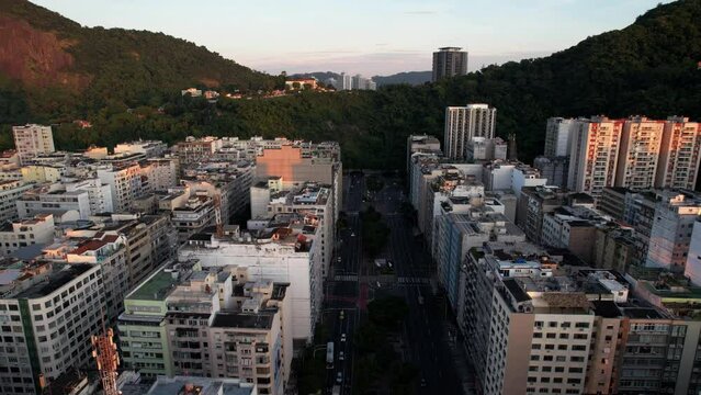 Rising above buildings in Copacabana revealing Botafogo Bay and Sugarloaf Mountain in Rio de Janeiro, Brazil