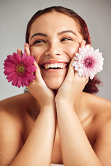 Woman, flowers and studio headshot with smile for beauty, wellness or skincare with spring...