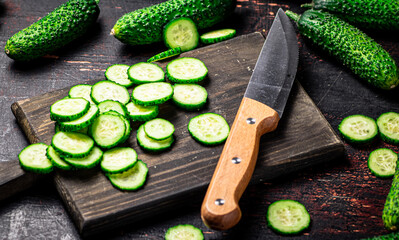 Cucumbers cut on a cutting board. 