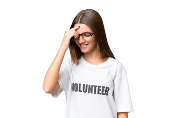 Teenager volunteer caucasian girl over isolated background laughing