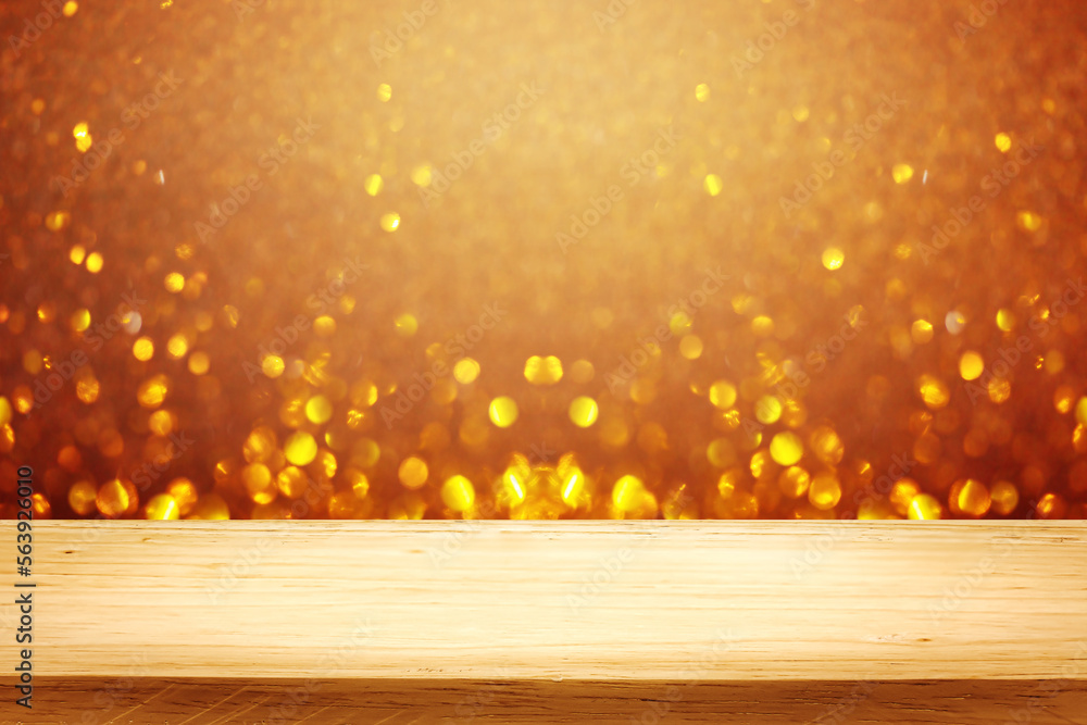 Poster empty wood table top on golden bokeh abstract background for montage products display new year,chris