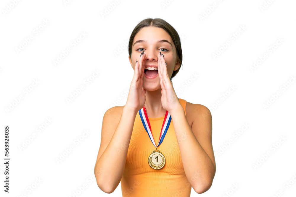 Poster Teenager caucasian girl with medals over isolated background shouting and announcing something