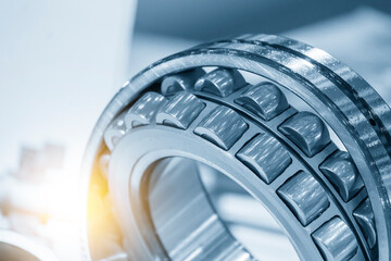 The cylindrical rolling bearing parts in light blue scene.