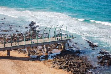 View of the Indian Ocean through the Millennium Pier in Umhlanga Rocks. Durban, South Africa.	