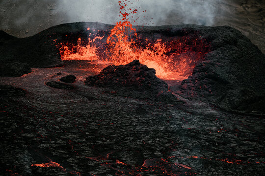 Volcano bursting with hot lava