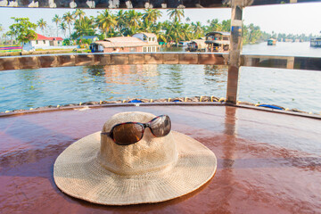 Showing hat in Alappuzha Or Alleppey boathouse on Backwater in Kerala. Travel with family and...