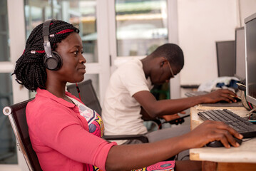 close-up of young students at computer class.