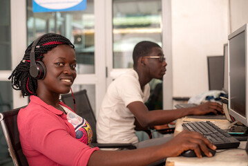 close-up of young students at computer class.