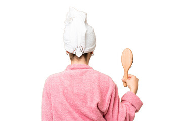 Young girl with hair comb in back position