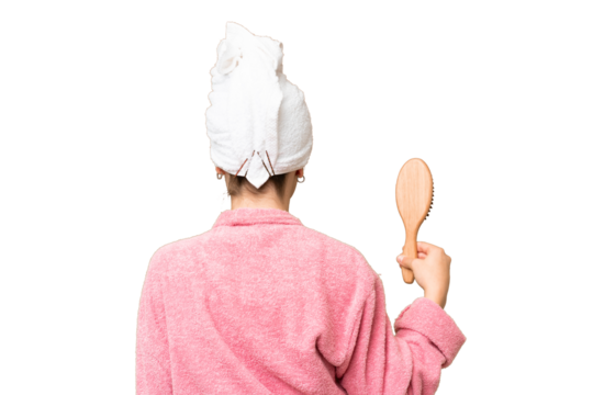 Young girl with hair comb in back position