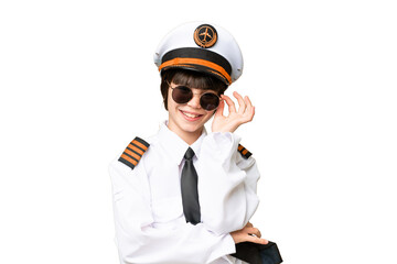 Little girl as a Airplane pilot over isolated chroma key background with glasses and happy