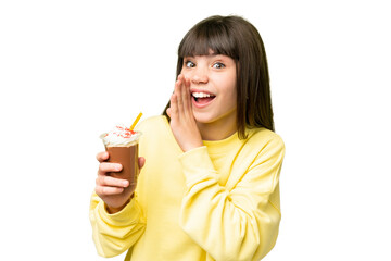 Little girl with chocolat cream over isolated chroma key background whispering something