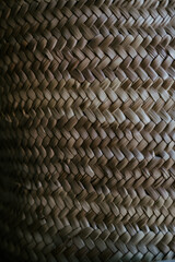 Close Up of woven basket texture, brown background