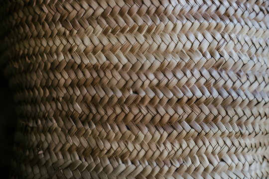 Close Up of woven basket texture, brown background