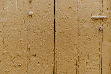 Background old wooden door, ocher 