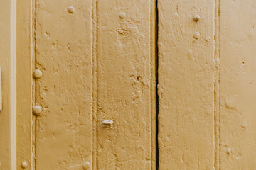 Background old wooden door, ocher 