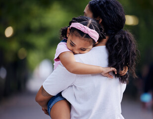 Love, sad and mother carrying girl outdoors, bonding and hugging. Motherhood support, family care...