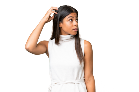 Young African american woman over isolated background having doubts while scratching head