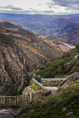 People looking over the Sil river canyon. Landscape view of Balcones de Madrid, Ribeira Sacra, Ourense, Galicia, Spain