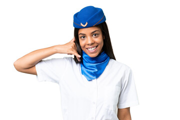 Airplane stewardess African american woman over isolated background making phone gesture. Call me back sign