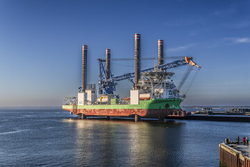 Vessel for supporting wind power turbines setup in Esbjerg harbor in Denmark