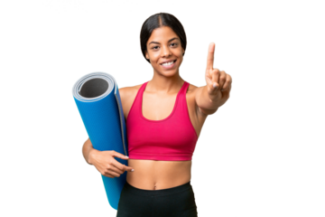 Young sport African American woman going to yoga classes while holding a mat over isolated background showing and lifting a finger