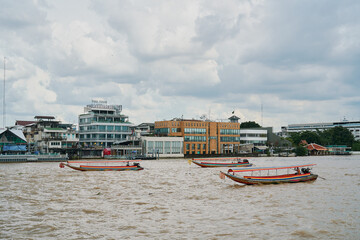 View of boats on Chao Phraya River. Bangkok, Thailand
