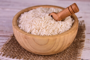 White rice in a wooden bowl.Close-up.
