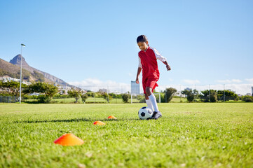 Football girl kid, training and grass for fitness, speed or balance with sport talent development,...