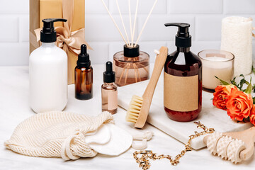 Beauty set of skin care  and hair care products lotion, gel, shampoo, serum, massage brushes, cotton pads for makeup remover. 