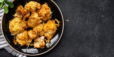 cauliflower with cheese baked vegetables healthy meal food snack on the table copy space food background rustic top view keto or paleo diet veggie vegan or vegetarian food