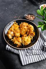 cauliflower with cheese baked vegetables healthy meal food snack on the table copy space food background rustic top view keto or paleo diet veggie vegan or vegetarian food