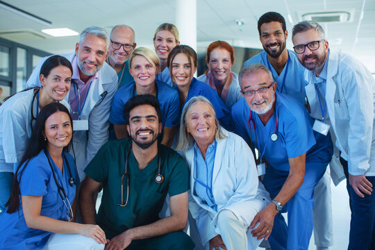 Portrait Of Happy Doctors, Nurses And Other Medical Staff In Hospital.